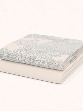 Nestig “Whirl” Crib Blue Wave Pattern Fitted Sheet - Light Blue & White